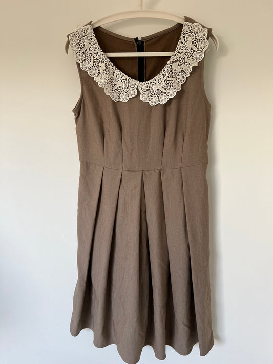 Brown dress with white lace collar